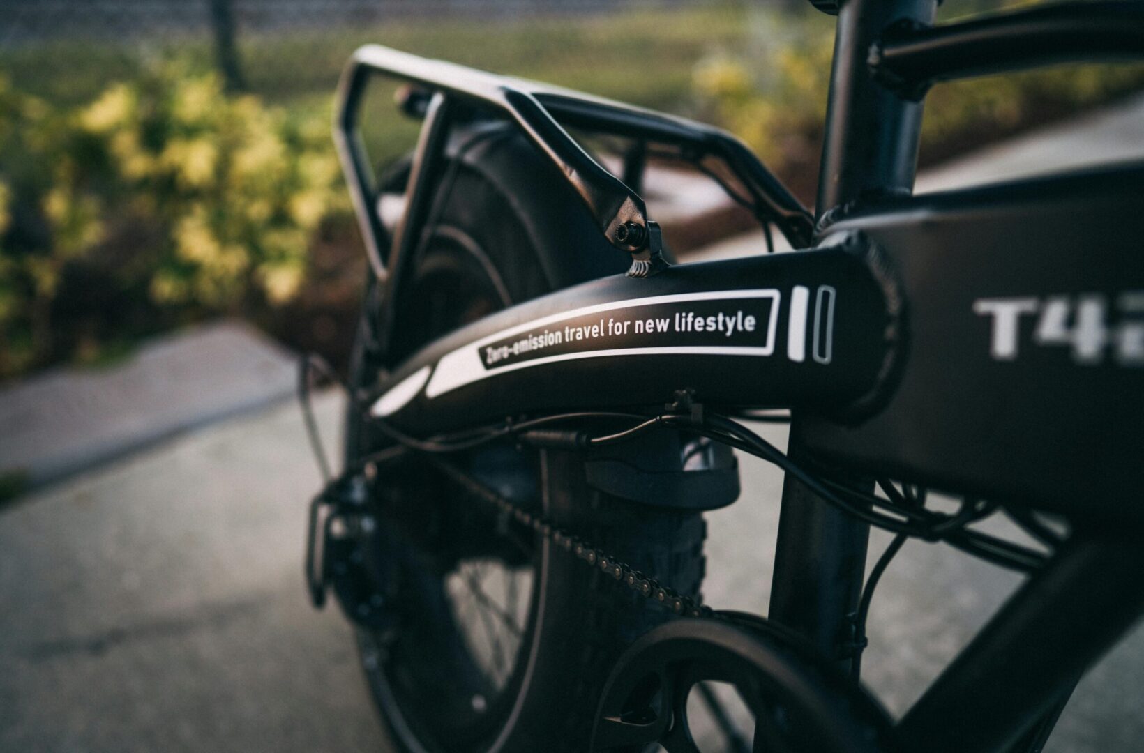 Detailed image of an electric bike with a focus on eco-friendly travel message.